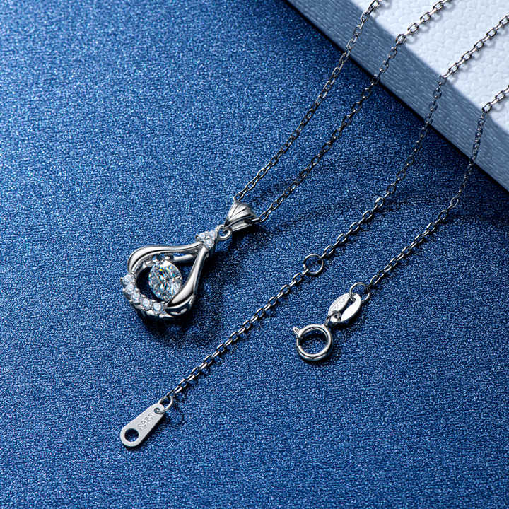 Pear-Shaped Dancing Moissanite Pendant Necklace – 0.5ct