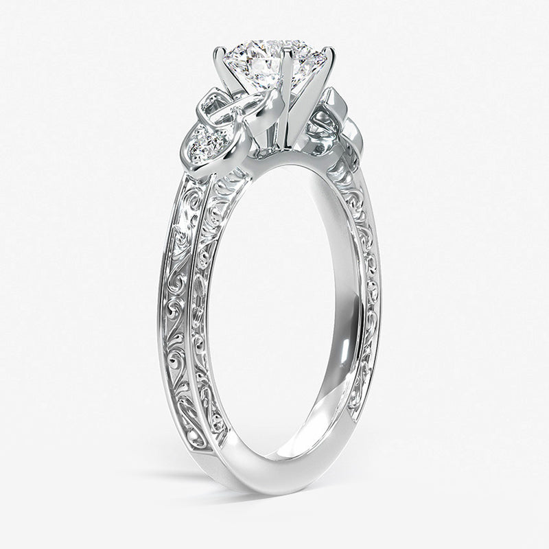 Vintage Three Stone Moissanite Scrollwork Engagement Ring